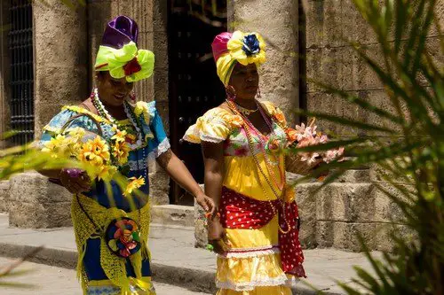 Cuban ladies dressed and going to a festival