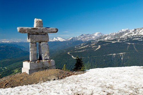 An Inukshuk at the Roundhouse at Whistler, Canada. These stone landmarks or cairn are used by the Inuit, Inupiat, Kalaallit, Yupik, and other peoples of the Arctic region of North America - and may have been used for navigation, as points of reference, markers for hunting grounds, or as food caches