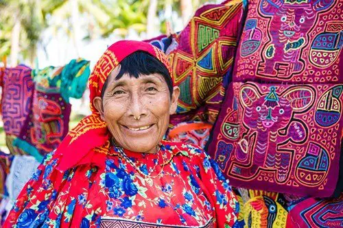 Kuna woman, Panama with traditional art works