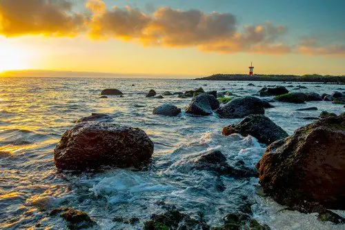 lighthouse at sunset in san cristobal galapagos islands ecuador