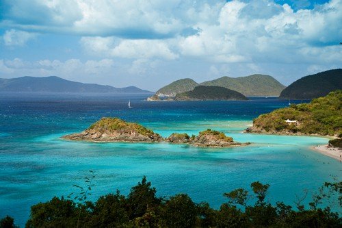 Sailboats and mountains on the horizon at the famous Trunk Bay St. John US Virgin Islands