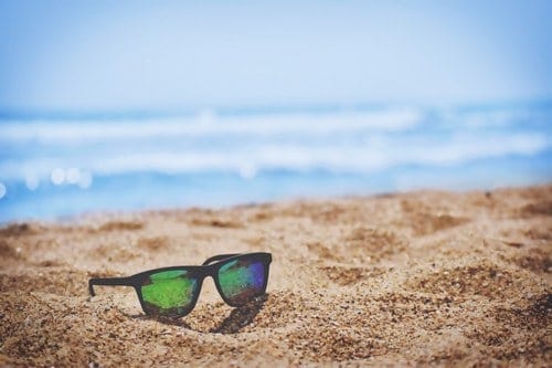 Sunglasses on the beach in the Bahamas - bahamas travel guide