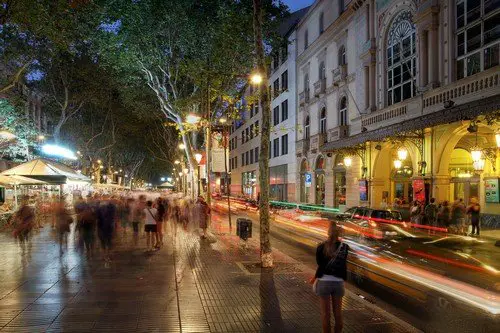 Crowded La Rambla street at the heart of Barcelona, Spain