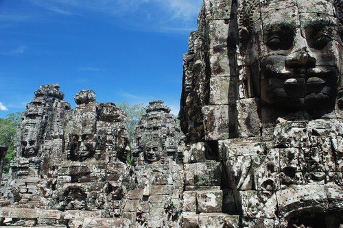 Bayon stone faces, Angkor temples, Cambodia. - Budget Cambodia Travel Guide