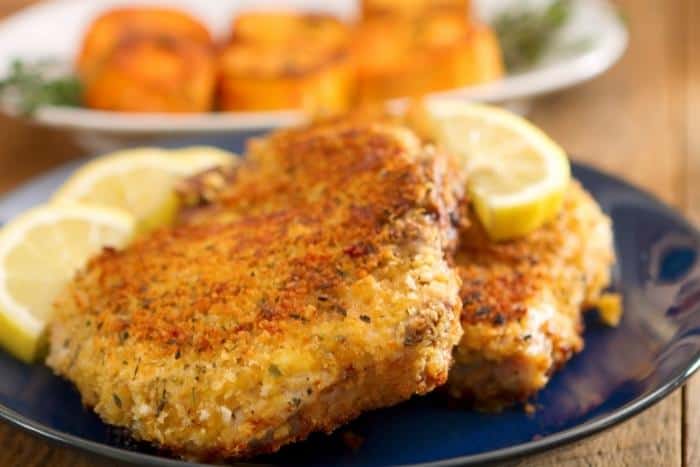 Baked Parmesan Pork Chops are tender and delicious with a crispy outside crust. These are a family favorite at dinner time! - Recipes from Bermuda