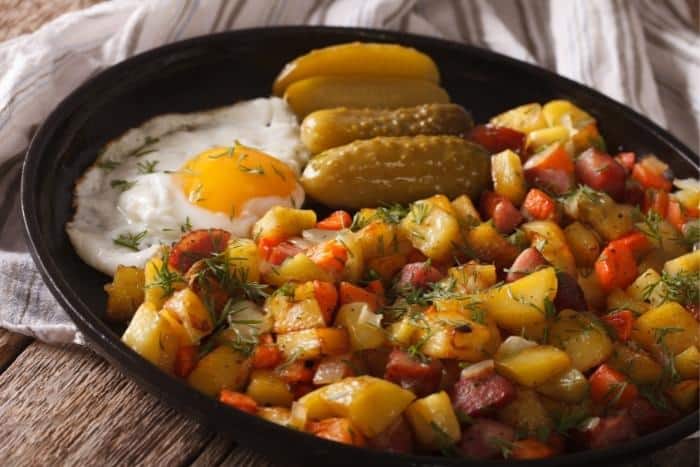 Norwegian Food called Pyttipaanne - Fried Potatoes with Sausages, Eggs, and Pickles - Norwegian Recipes