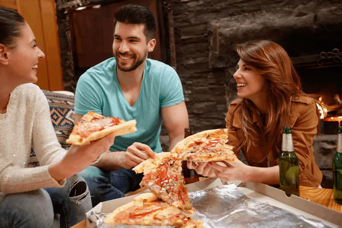 Italian people in traditional costume dining