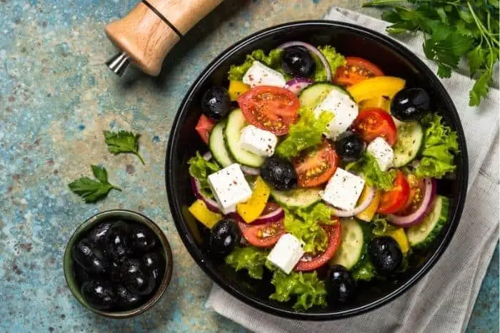 Greek salad: Vegetable salad from tomato, cucumber, feta cheese and olive oil. Greek Recipes