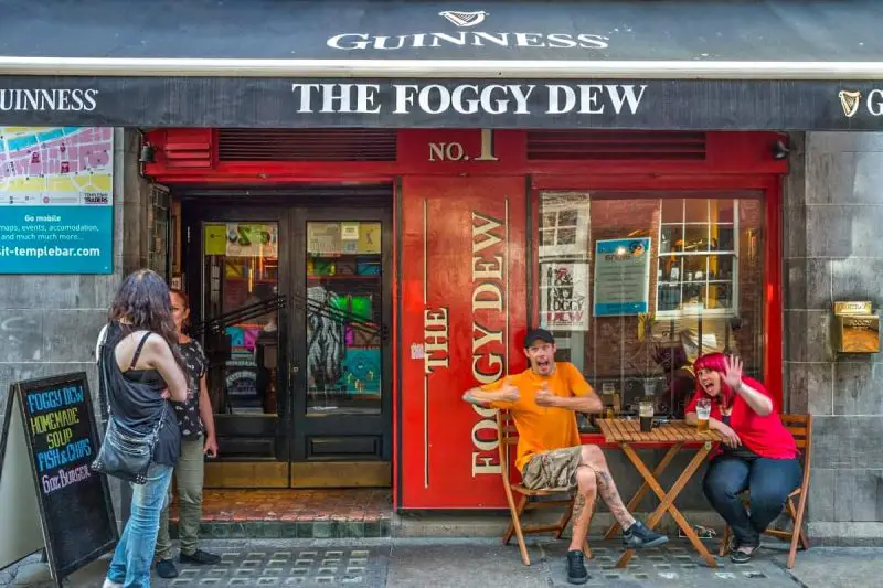 2 Irish Pub-goers in front of Pub