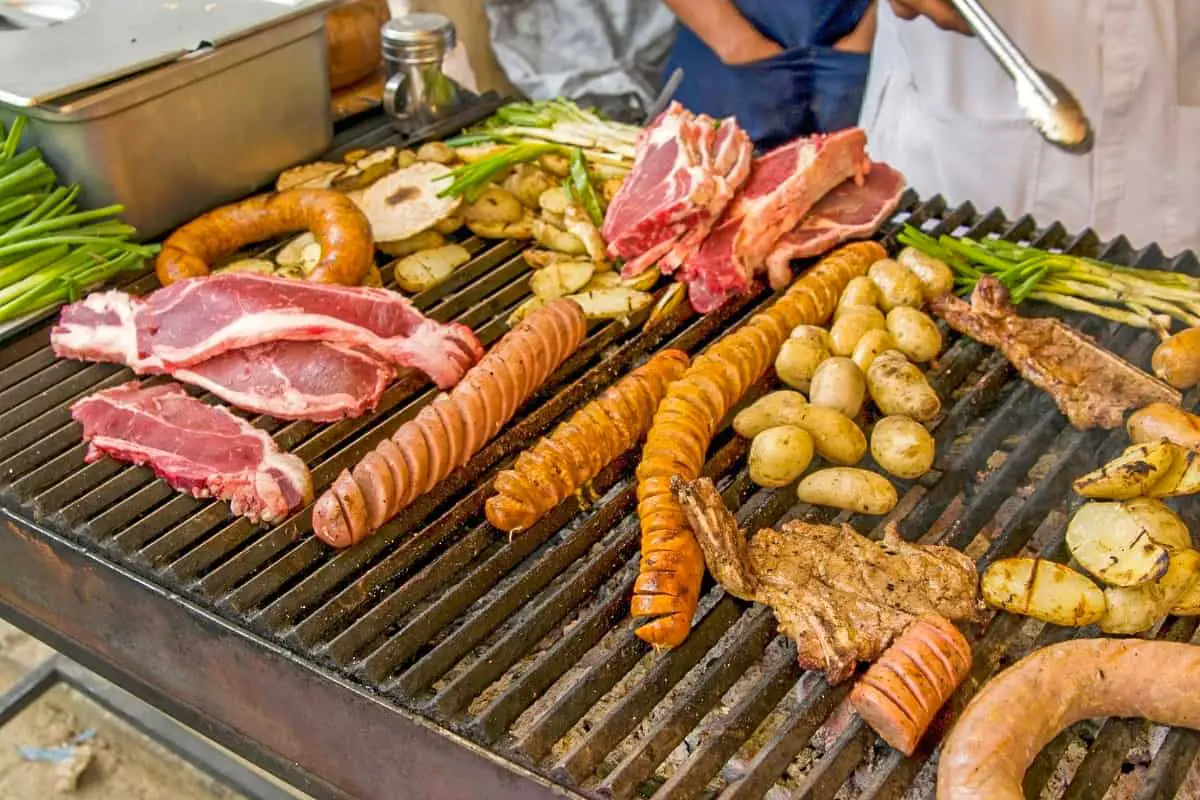 A grill full of Guatemalan chorizos, sausage, steak and other mystery meats.