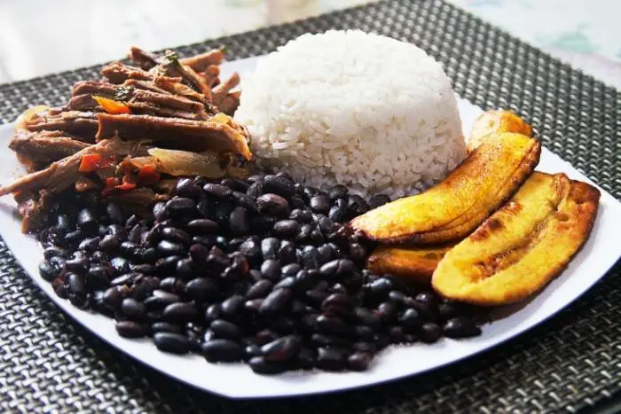 Traditional Venezuelan dish - Pabellon Criollo, a plate of rice, shredded beef in stew and stewed black beans.