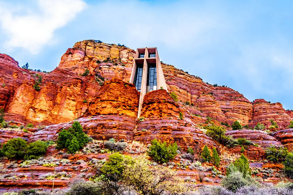 The Chapel of the Holy Cross in rain soaked red buttes of the sa