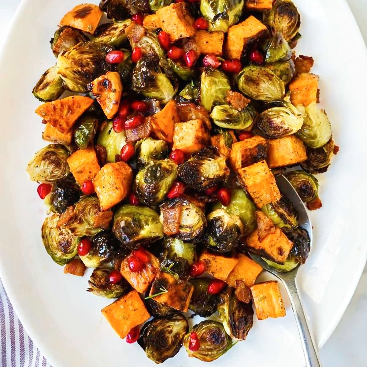 5. Oven-Roasted Brussels Sprouts and Sweet Potatoes - holiday brussel sprout recipes