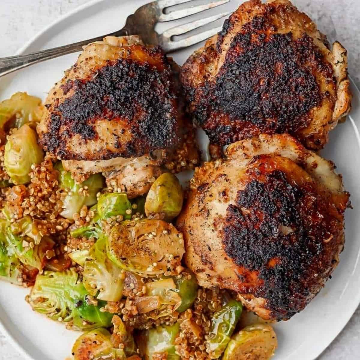Dutch Oven Chicken Thighs with Brussels Sprouts - Dutch Oven Recipes for Chicken Thighs