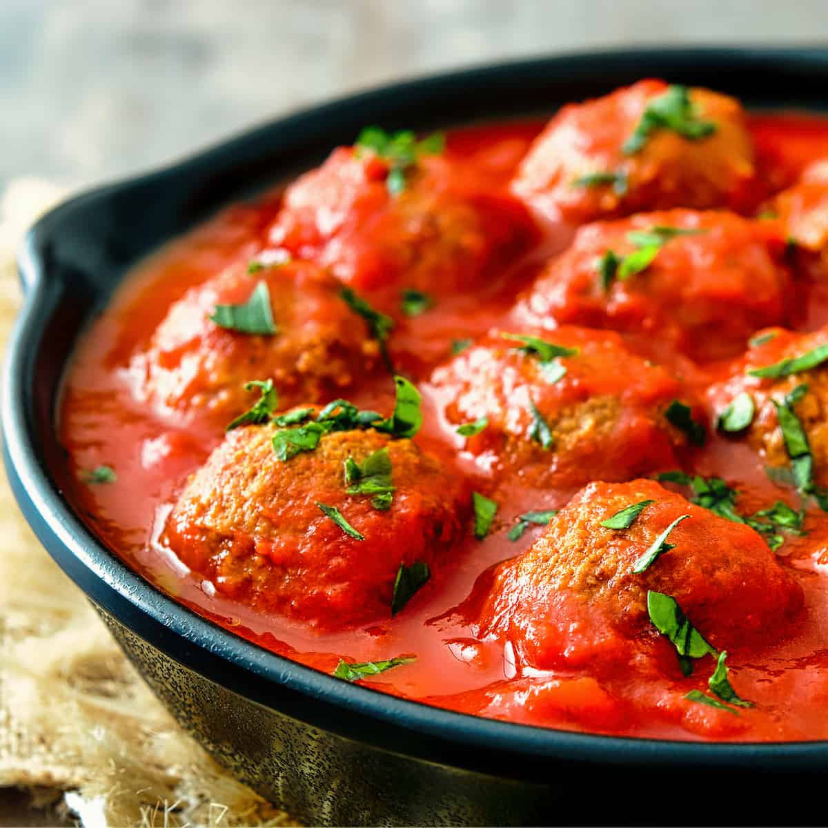 Spanish Style Albondigas in a Sunny Mediterranean Sauce - Spanish meatball recipes