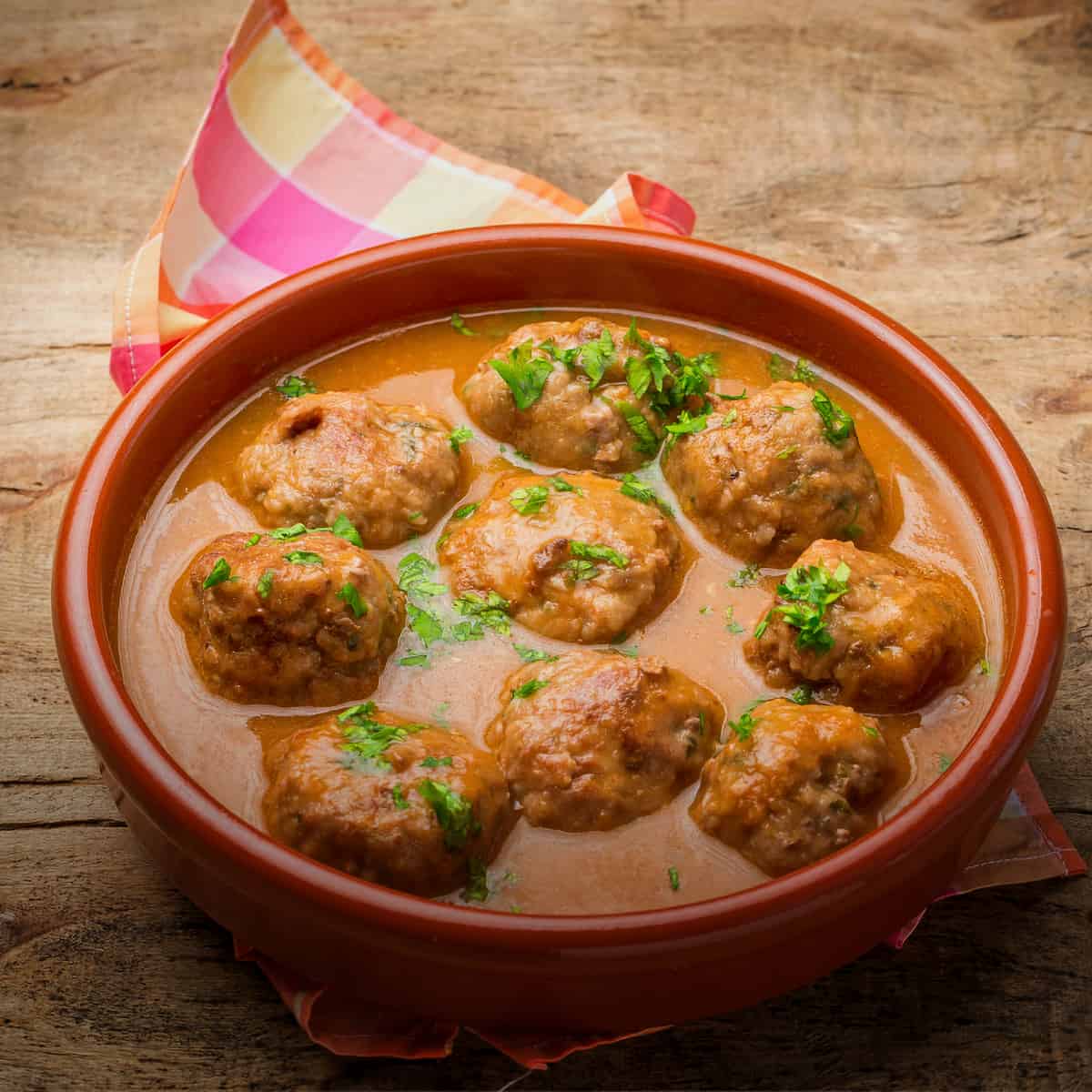 Spanish Style Albondigas in a Sunny Mediterranean Sauce - Spanish meatball recipes