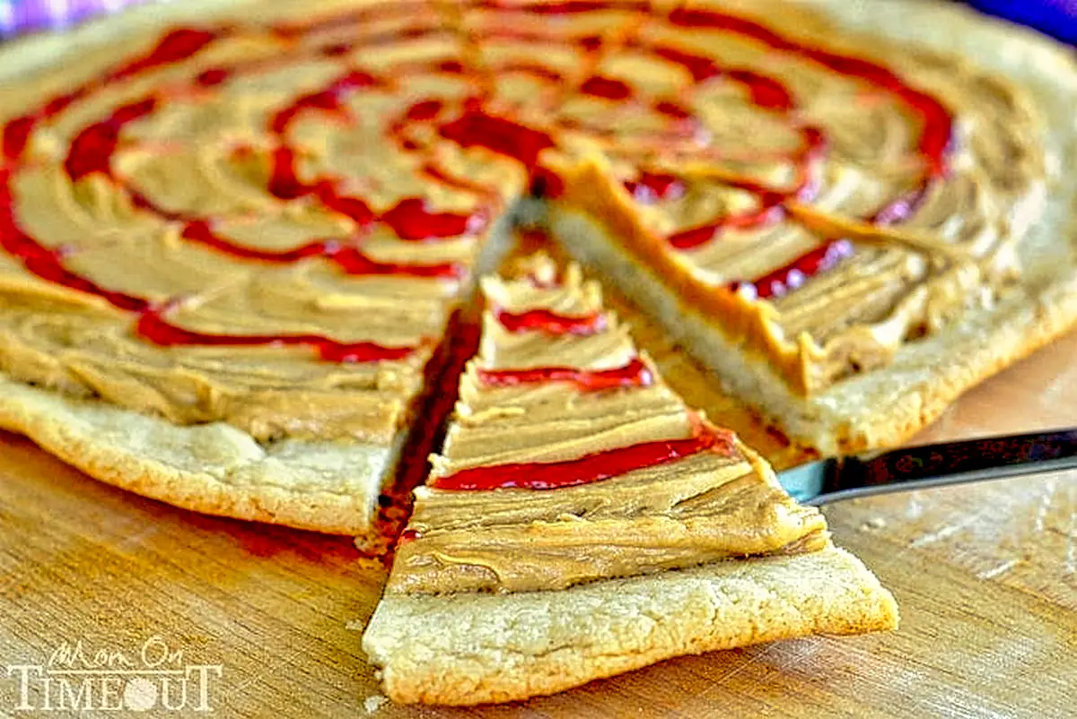 12. Peanut Butter and Jelly Pizza Cookie - learn how to make cookie pizza desserts