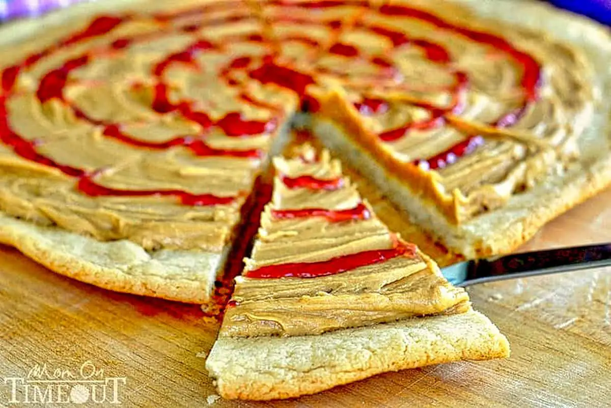 12. Peanut Butter and Jelly Pizza Cookie - learn how to make cookie pizza desserts