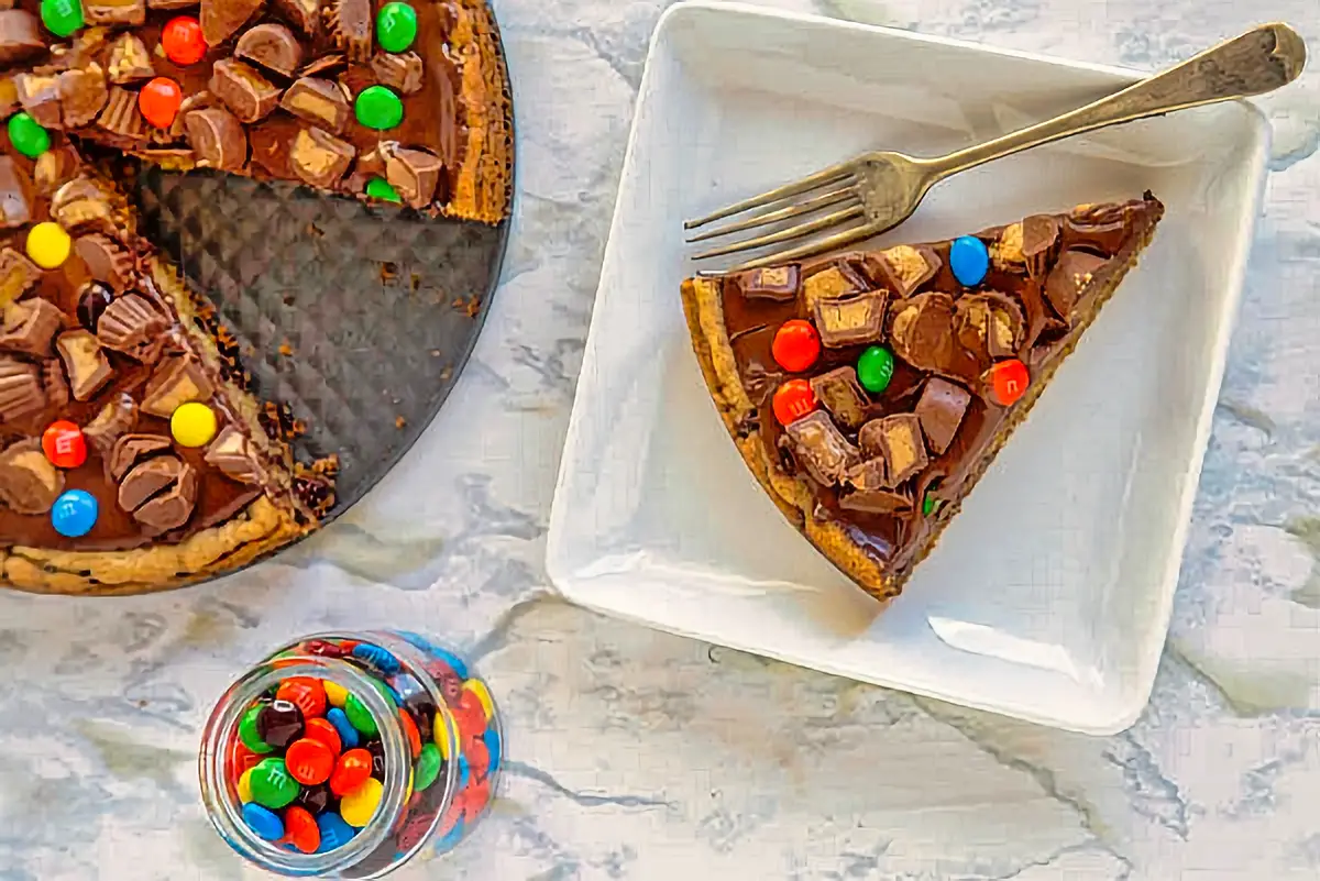15. Candy Bar Cookie Pizza - learn how to make cookie pizza desserts