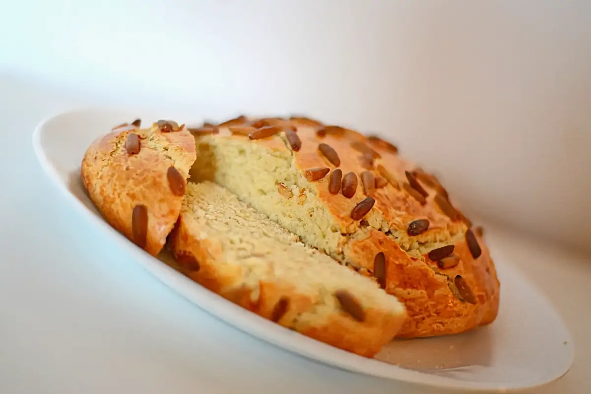 9. Coques – (Pine nuts “coca” pastry)
