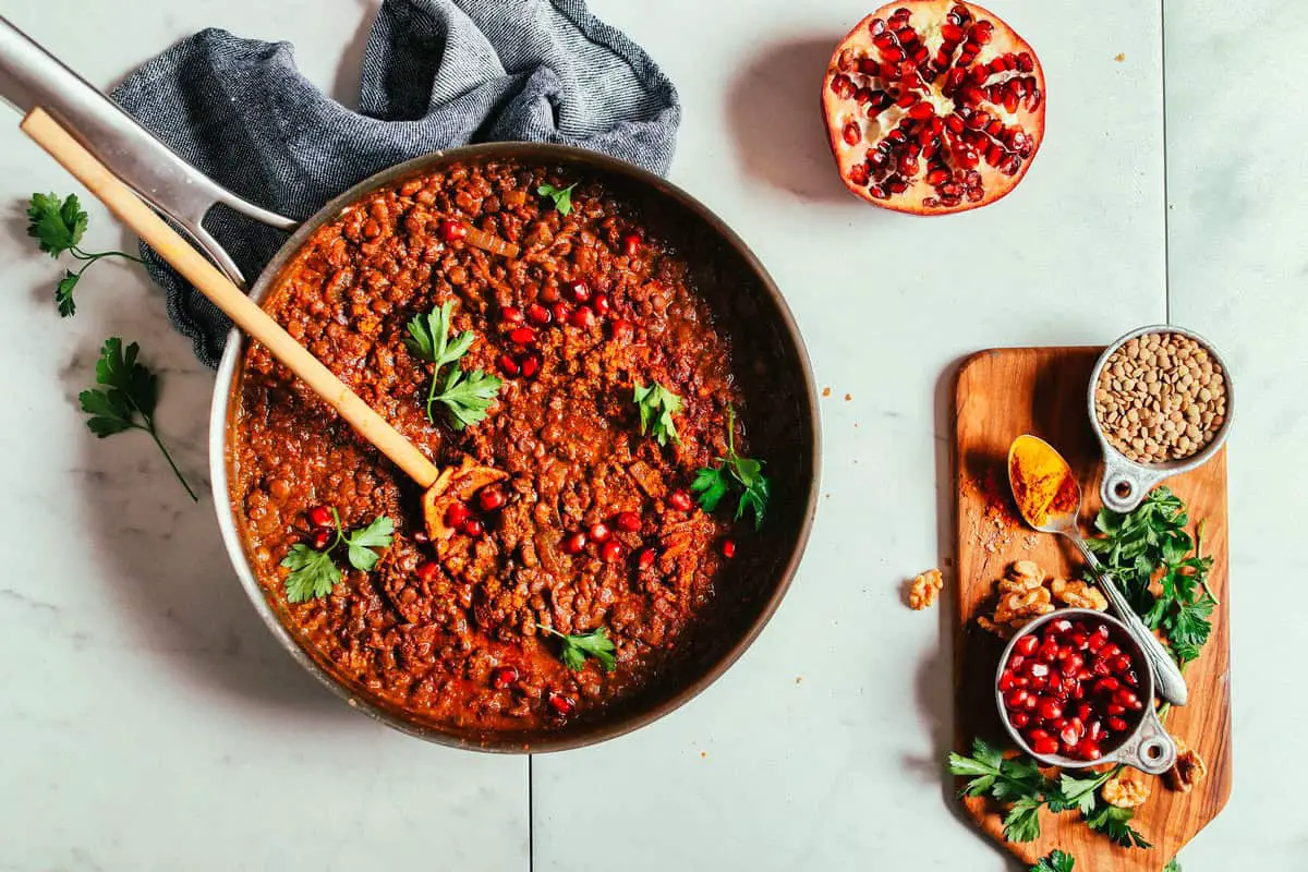 1. Vegan Lentil Fesenjān (Pomegranate Walnut Stew)