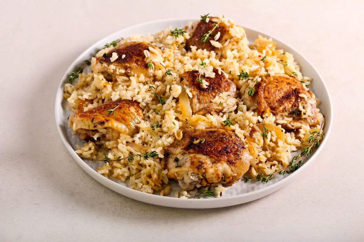 17. Dutch Oven Chicken Thighs and Rice Recipe